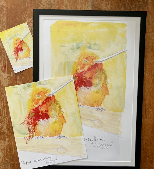 Watercolor painting of a bird with a red beak